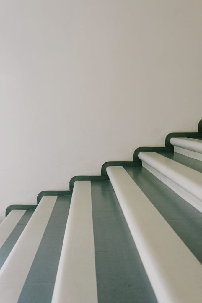 Stairway with striped stairs in residential building